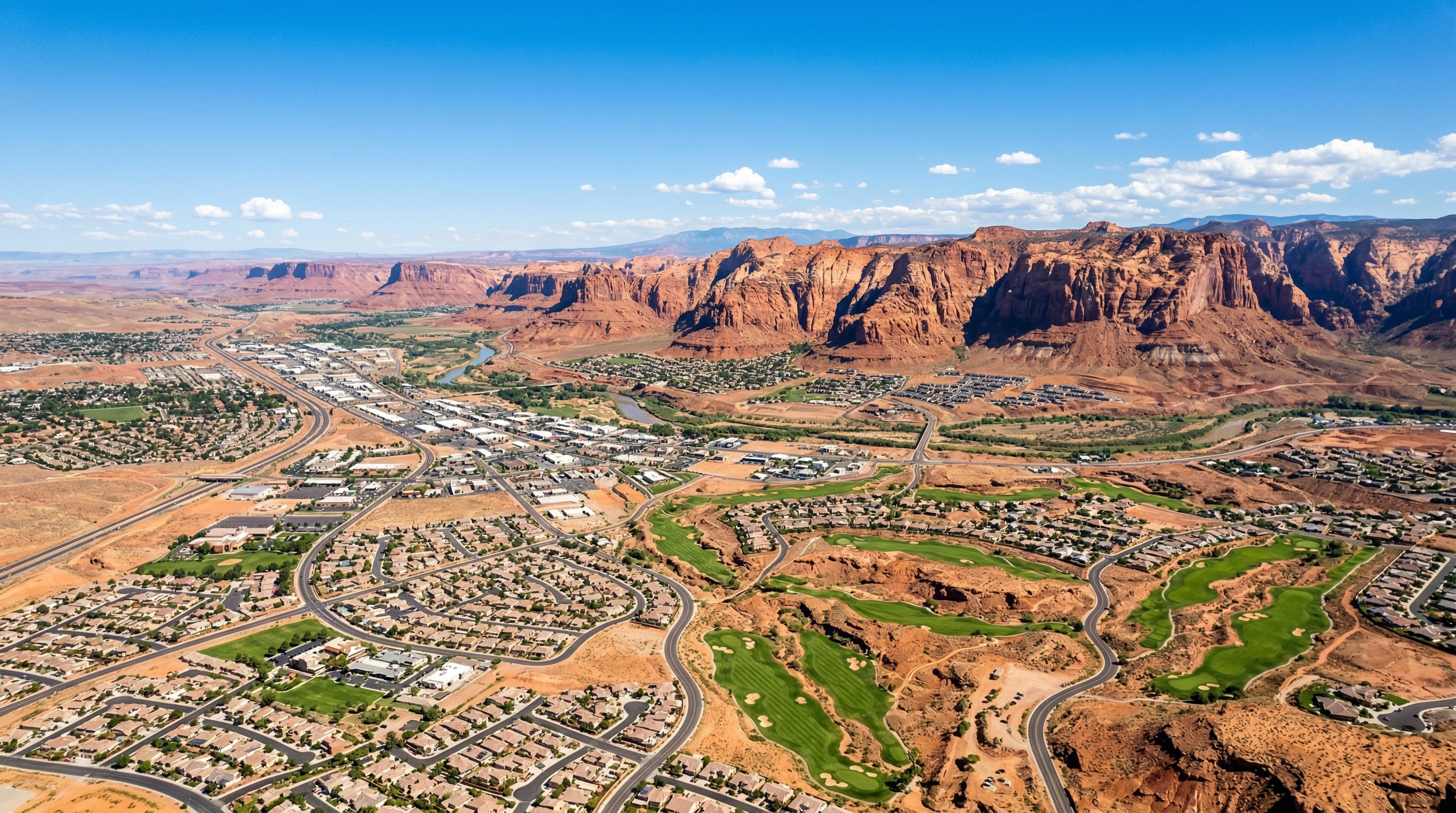 St. George Utah cityscape with red rock cliffs